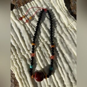 Beaded Necklace with Red and Black Accents